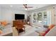 Comfortable living area with access to the outdoor patio and pool views at 5 S Basilica Ave, Hanahan, SC 29410