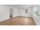 Cozy bedroom with hardwood floors, natural light, and a closet at 5163 W Dolphin St, North Charleston, SC 29405