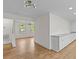 Spacious living area with hardwood floors and modern lighting at 5163 W Dolphin St, North Charleston, SC 29405