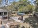 Spacious backyard featuring a brick grill, upper deck and an above ground pool at 521 Pelzer Dr, Mount Pleasant, SC 29464