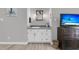 Stylish bathroom with a white vanity, modern fixtures, and decor at 521 Pelzer Dr, Mount Pleasant, SC 29464