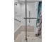 Accessible shower with a built-in seat, grab bars, and a shower curtain for added privacy at 521 Pelzer Dr, Mount Pleasant, SC 29464