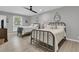 Bedroom with two metal beds, large windows providing plenty of natural light at 521 Pelzer Dr, Mount Pleasant, SC 29464