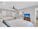 Bedroom with two beds, a TV and a bathroom vanity, large windows providing plenty of natural light at 521 Pelzer Dr, Mount Pleasant, SC 29464
