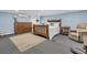 Cozy bedroom with a wooden bed frame and plenty of storage space at 521 Pelzer Dr, Mount Pleasant, SC 29464