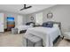 Bedroom with two beds, a chest of drawers and a TV, large windows providing plenty of natural light at 521 Pelzer Dr, Mount Pleasant, SC 29464
