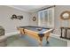 Game room featuring pool table with custom decor and natural light at 521 Pelzer Dr, Mount Pleasant, SC 29464