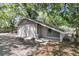 Detached two-car garage with a white exterior, offering ample storage and parking space at 521 Pelzer Dr, Mount Pleasant, SC 29464