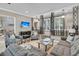 Elegant living room featuring stylish furniture, decorative accents, and ample natural light at 521 Pelzer Dr, Mount Pleasant, SC 29464