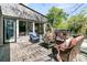 Charming outdoor patio with wicker furniture, offering a relaxing space to enjoy the backyard scenery at 521 Pelzer Dr, Mount Pleasant, SC 29464