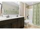 Well-lit bathroom with a double vanity and shower/bath combo at 5451 Kings River Dr, North Charleston, SC 29420