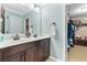 Bathroom featuring a double sink vanity with dark wood cabinets at 5451 Kings River Dr, North Charleston, SC 29420