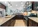 Open kitchen with stainless appliances, granite counters, and a view into the gathering room at 5451 Kings River Dr, North Charleston, SC 29420
