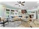 Bright and airy living room with a view of the kitchen at 5451 Kings River Dr, North Charleston, SC 29420