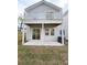 Backyard featuring a patio, sliding glass doors, and a second-story balcony at 5841 Kirkwood Ave, North Charleston, SC 29406