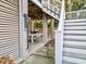 Outdoor dining area with a table and chairs, perfect for entertaining and enjoying the backyard at 6 Intracoastal Ct, Isle of Palms, SC 29451