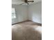 Comfortable bedroom with neutral carpet and abundant natural light, perfect for rest and relaxation at 609 Coral St, Mount Pleasant, SC 29464