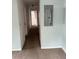 Hallway with carpet and neutral walls, creating a seamless transition between living spaces at 609 Coral St, Mount Pleasant, SC 29464