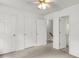 Bedroom view featuring multiple doors and neutral carpet at 6260 Brandt St # 4-D, North Charleston, SC 29406
