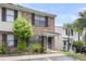 Brick townhome with black shutters, and a well-manicured lawn at 6260 Brandt St # 4-D, North Charleston, SC 29406