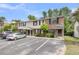 Attractive brick townhome with black shutters, parking, and a welcoming front entrance at 6260 Brandt St # 4-D, North Charleston, SC 29406