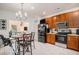 Bright kitchen with stainless steel appliances, wood cabinetry, and a connected dining area at 632 Grassy Hill Rd, Summerville, SC 29483