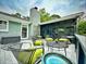 Back deck with outdoor seating offers a perfect blend of relaxation and entertainment with scenic views and ample space at 717 Chatter Rd, Mount Pleasant, SC 29464