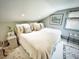 Inviting bedroom with plush bedding, soft lighting, and charming decor at 717 Chatter Rd, Mount Pleasant, SC 29464