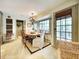 Cozy breakfast nook featuring a round table, stylish chairs, and a sunlit bay window, creating a welcoming dining space at 717 Chatter Rd, Mount Pleasant, SC 29464
