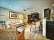A spacious living room with hardwood floors, a ceiling fan, and comfortable seating at 717 Chatter Rd, Mount Pleasant, SC 29464