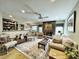 Inviting living room with fireplace, plush sofa, and elegant furnishings at 717 Chatter Rd, Mount Pleasant, SC 29464