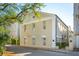 Elegant multi-story building, showcasing classic architecture, multiple windows and corner location at 8 Prioleau St # Th A, Charleston, SC 29401