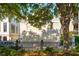 Beautiful building with classic architecture, multiple windows and manicured landscaping at 8 Prioleau St # Th A, Charleston, SC 29401