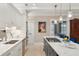 Well-equipped kitchen area featuring modern appliances, white cabinetry, and stylish fixtures at 8 Prioleau St # Th A, Charleston, SC 29401