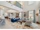 Spacious living room showcasing a two-story layout, comfortable seating, and stylish decor at 8 Prioleau St # Th A, Charleston, SC 29401