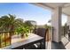 Enjoy the coastal breeze from the balcony with distant ocean views at 8000 Palmetto Dr # 104-A, Isle of Palms, SC 29451