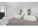Bedroom features two beds and television with a view at 8000 Palmetto Dr # 104-A, Isle of Palms, SC 29451