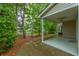 Covered back porch for outdoor enjoyment at 8624 Grassy Oak Trl, North Charleston, SC 29420