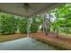 Covered back porch for enjoying the outdoors at 8624 Grassy Oak Trl, North Charleston, SC 29420