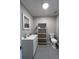 Modern bathroom with vanity and open shelving at 8701 Caspiana Ln, North Charleston, SC 29420