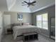 Inviting bedroom with vaulted ceiling and ample natural light at 8701 Caspiana Ln, North Charleston, SC 29420