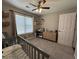 A bright Bedroom features storage baskets, decorative shelves, and a changing table with drawers at 8701 Caspiana Ln, North Charleston, SC 29420