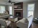 Bright living room with fireplace and modern furniture at 8701 Caspiana Ln, North Charleston, SC 29420