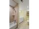 Bathroom features a tub-shower combo and a neutral tile shower with vanity at 8800 Dorchester Rd # 4001, North Charleston, SC 29420
