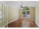 Office area featuring wood floors, a ceiling fan, and a large window with lots of natural light at 8800 Dorchester Rd # 4001, North Charleston, SC 29420