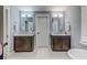 Bright bathroom features marble floors, and sinks, and stylish fixtures at 902 Mikell Dr, Charleston, SC 29412