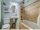 Cozy bathroom with tile floor, vanity, and shower-tub combination at 902 Mikell Dr, Charleston, SC 29412