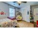 Cozy bedroom with a cozy chair and natural light at 902 Mikell Dr, Charleston, SC 29412