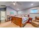 Bright bedroom featuring hardwood floors, natural light, and a cozy atmosphere at 902 Mikell Dr, Charleston, SC 29412