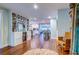 Open-concept living space featuring hardwood floors, custom built-ins, and modern decor at 902 Mikell Dr, Charleston, SC 29412
